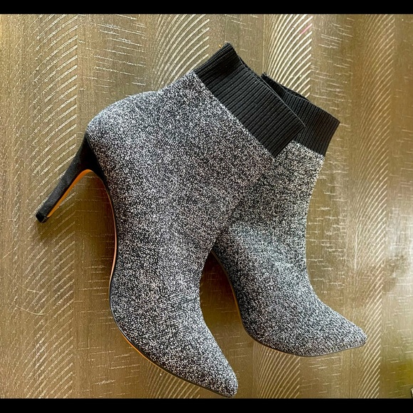 Black and silver, never worn. Fits like a sock. - Picture 1 of 4